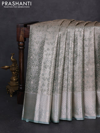 Bangalori tissue silk saree pastel green with allover zari woven brocade weaves and long zari woven border