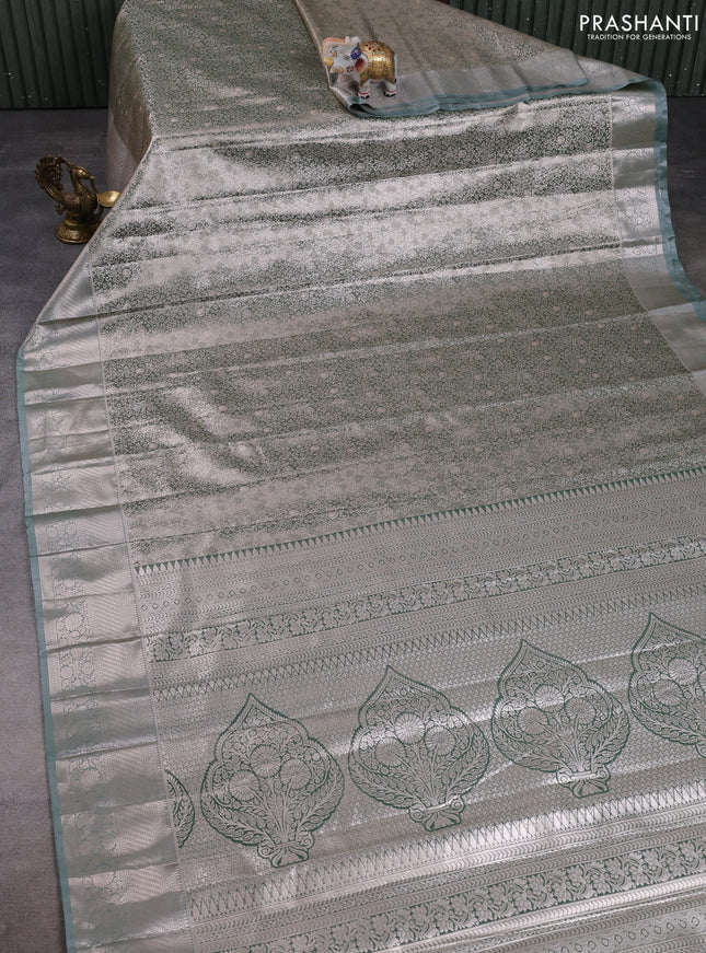 Bangalori tissue silk saree pastel green with allover zari woven brocade weaves and long zari woven border