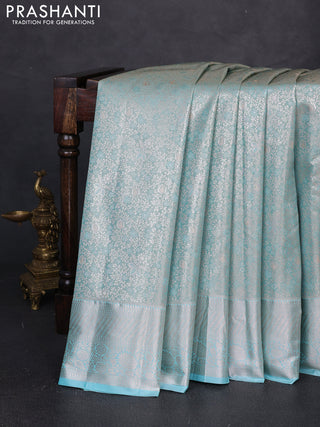 Bangalori tissue silk saree teal blue with allover zari woven brocade weaves and long zari woven border