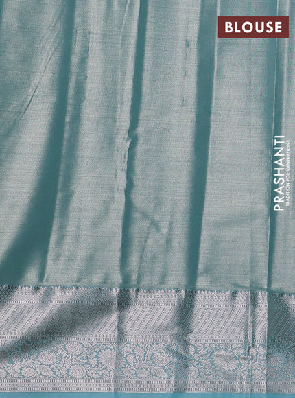 Bangalori tissue silk saree teal blue with allover zari woven brocade weaves and long zari woven border