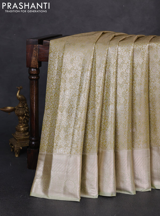 Bangalori tissue silk saree mehendi green with allover zari woven brocade weaves and long zari woven border
