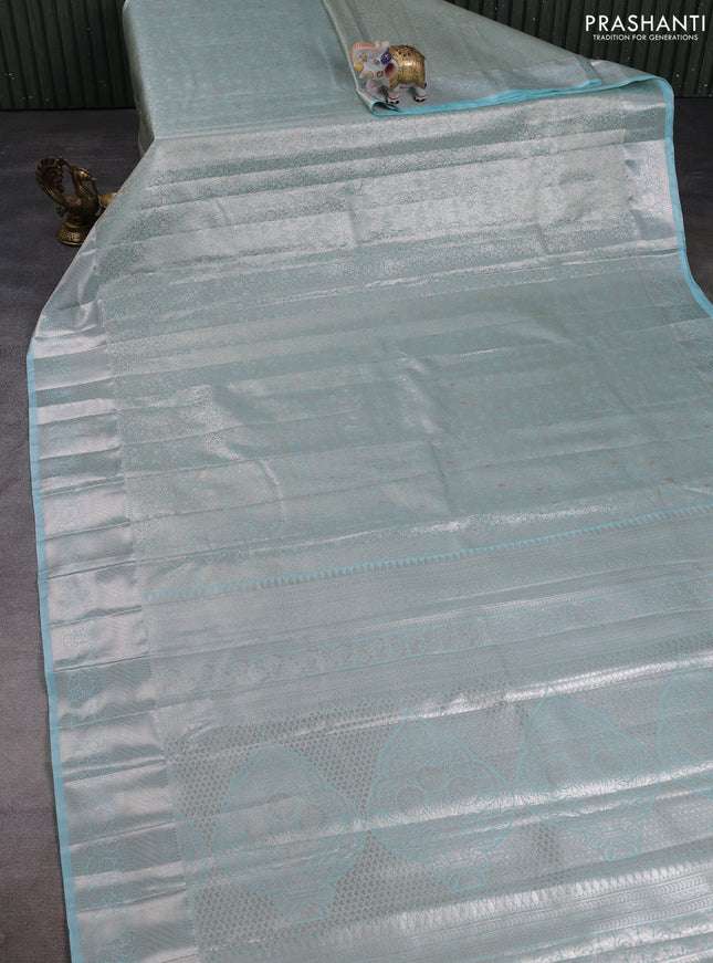 Bangalori tissue silk saree teal blue with allover zari woven brocade weaves and zari woven border
