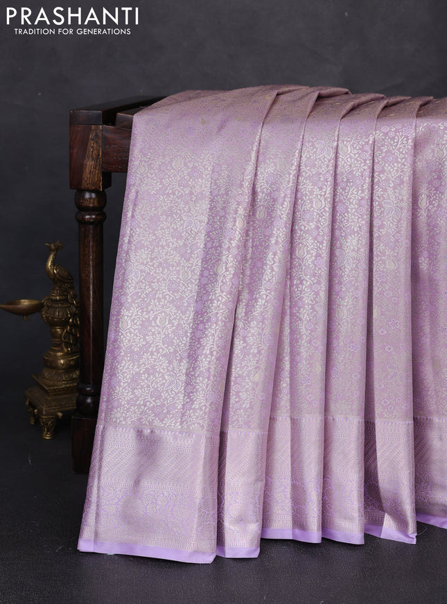 Bangalori tissue silk saree lavender with allover zari woven brocade weaves and zari woven border