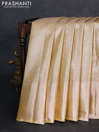 Bangalori tissue silk saree mustard yellow and pale yellow with allover zari woven brocade weaves and long zari woven border