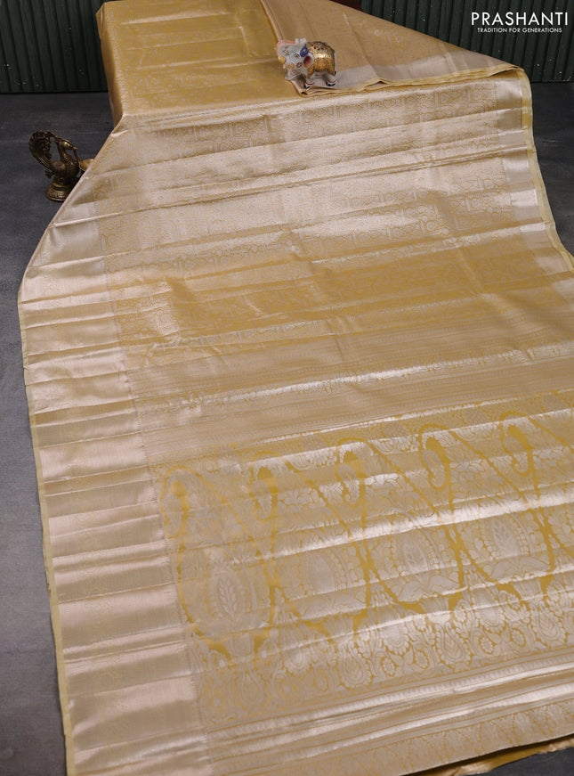 Bangalori tissue silk saree mustard yellow and pale yellow with allover zari woven brocade weaves and long zari woven border