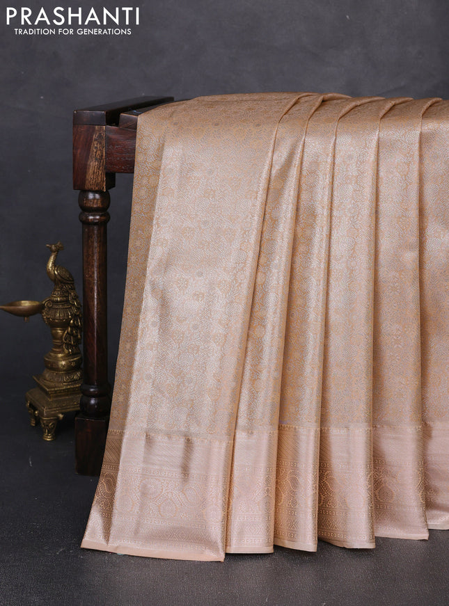 Bangalori tissue silk saree peach orange with allover zari woven brocade weaves and zari woven border