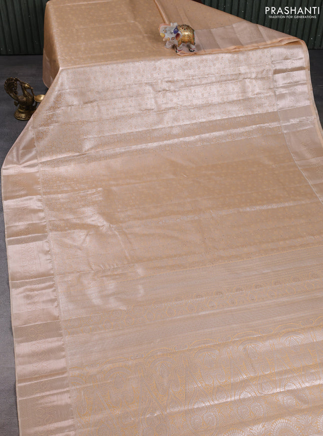 Bangalori tissue silk saree peach orange with allover zari woven brocade weaves and zari woven border
