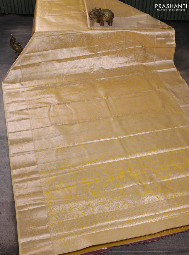 Bangalori tissue silk saree mustard yellow with allover zari woven brocade weaves and zari woven border