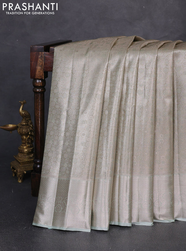 Bangalori tissue silk saree pista green with allover zari woven brocade weaves and long zari woven border