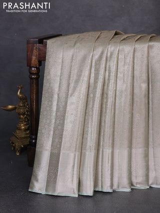 Bangalori tissue silk saree pista green with allover zari woven brocade weaves and long zari woven border