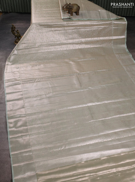 Bangalori tissue silk saree pista green with allover zari woven brocade weaves and long zari woven border
