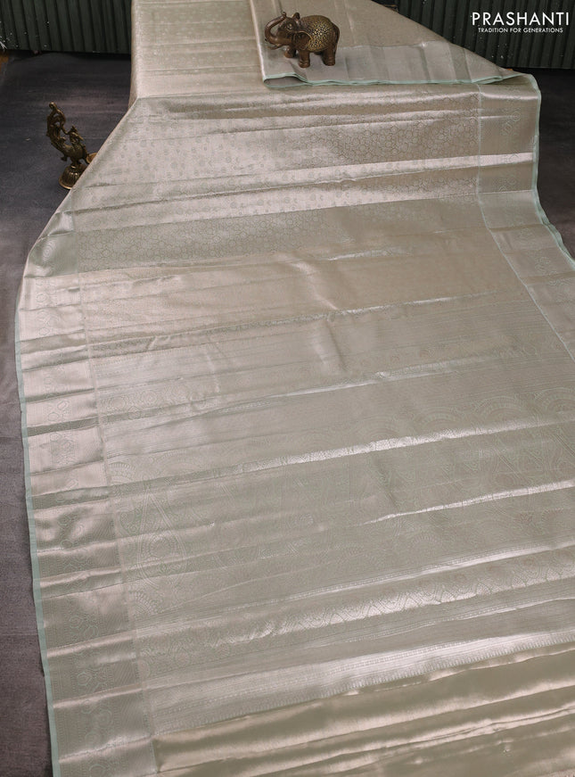 Bangalori tissue silk saree pista green with allover zari woven brocade weaves and long zari woven border