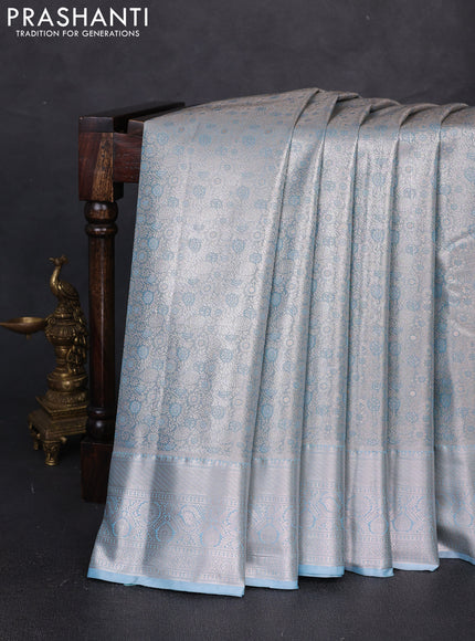 Bangalori tissue silk saree blue with allover zari woven brocade weaves and long zari woven border
