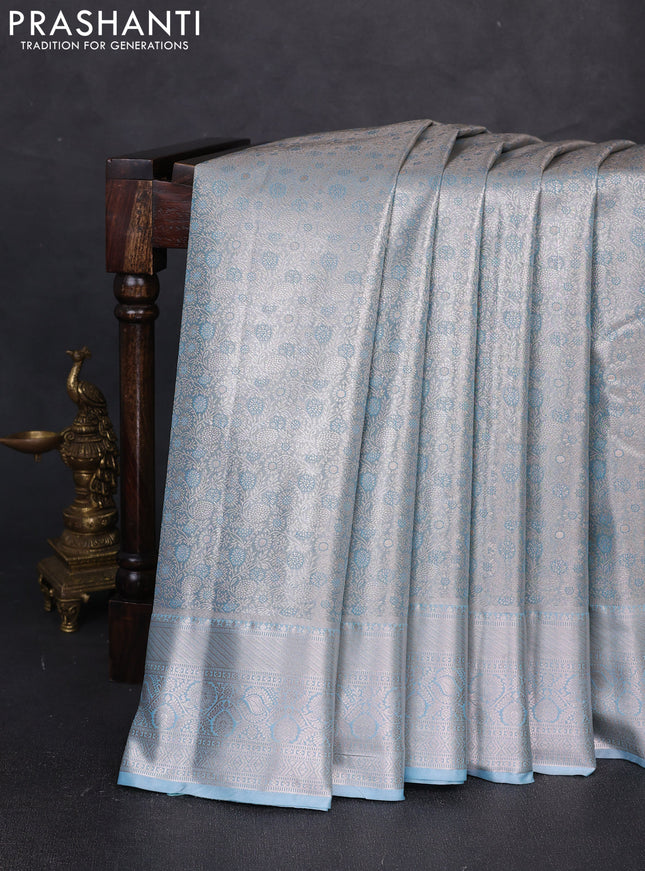 Bangalori tissue silk saree blue with allover zari woven brocade weaves and long zari woven border