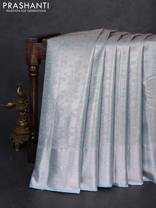 Bangalori tissue silk saree blue with allover zari woven brocade weaves and long zari woven border