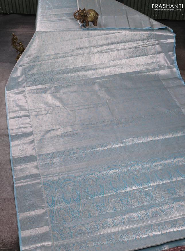 Bangalori tissue silk saree blue with allover zari woven brocade weaves and long zari woven border