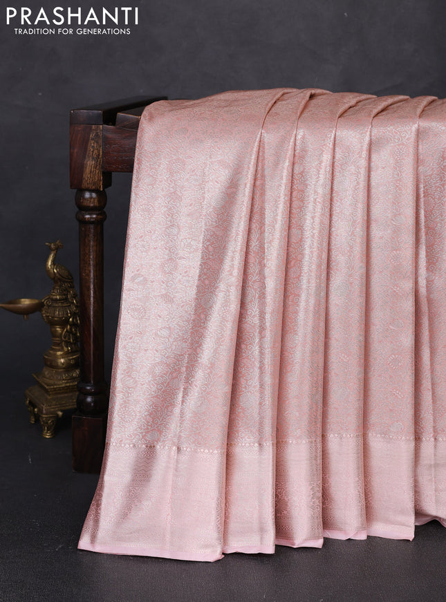 Bangalori tissue silk saree peach with allover zari woven brocade weaves and zari woven border