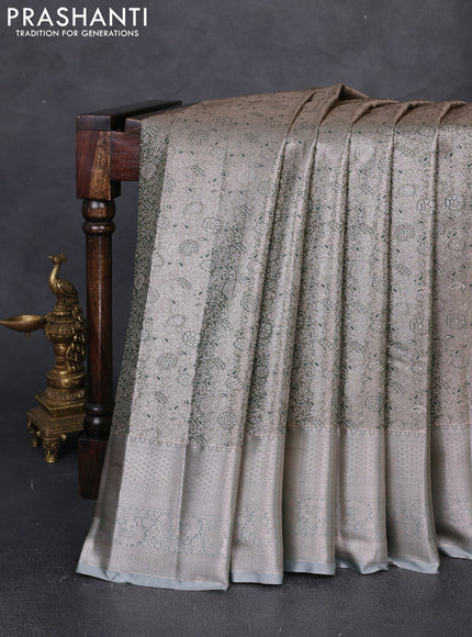 Bangalori tissue silk saree pastel green with allover zari woven brocade weaves and long zari woven border