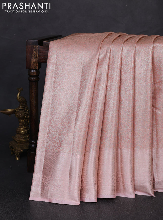 Bangalori tissue silk saree peach with allover zari woven brocade weaves and zari woven border