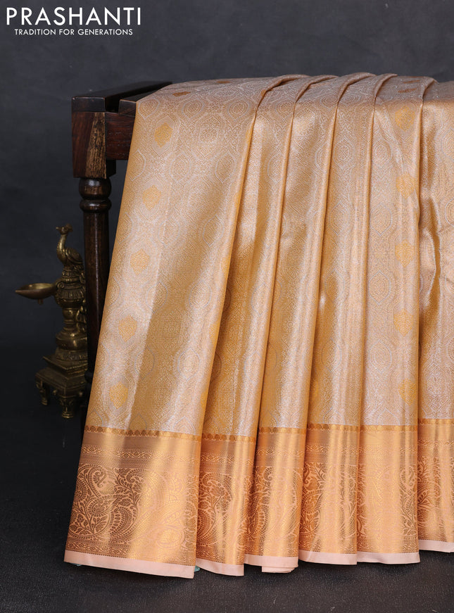 Bangalori tissue silk saree pale orange with allover zari woven brocade weaves and zari woven border