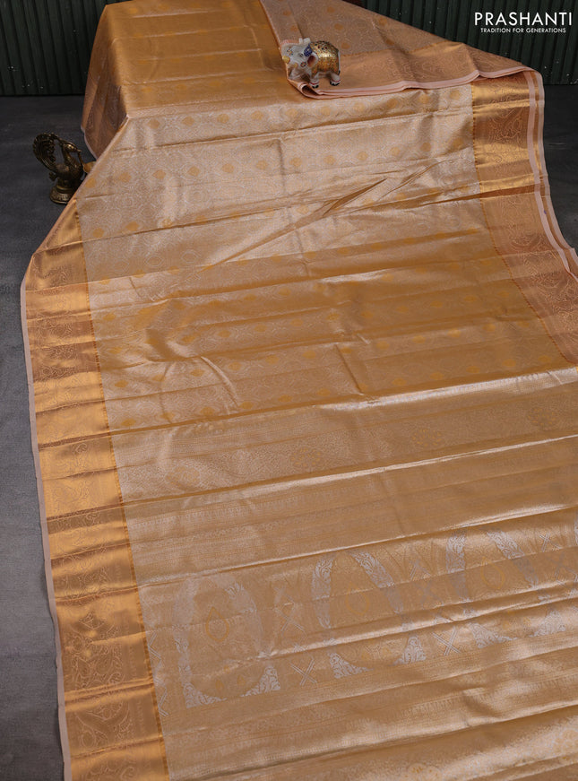 Bangalori tissue silk saree pale orange with allover zari woven brocade weaves and zari woven border