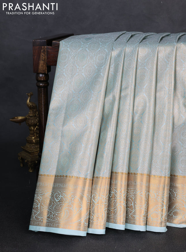 Bangalori tissue silk saree teal green with allover zari woven brocade weaves and zari woven border