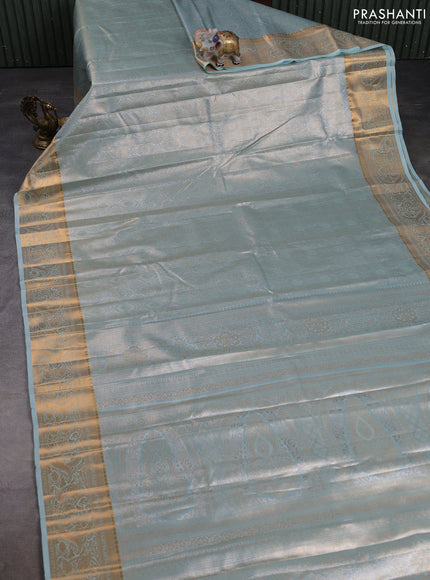Bangalori tissue silk saree teal green with allover zari woven brocade weaves and zari woven border