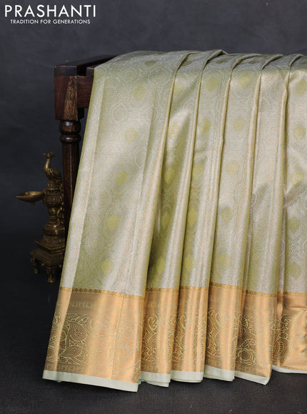 Bangalori tissue silk saree pista green with allover zari woven brocade weaves and zari woven border