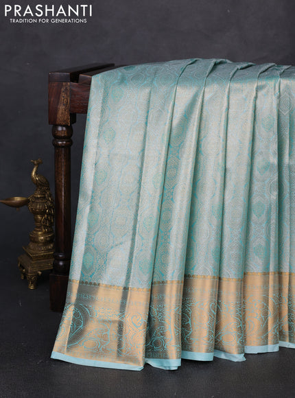 Bangalori tissue silk saree teal green with allover zari woven brocade weaves and zari woven border
