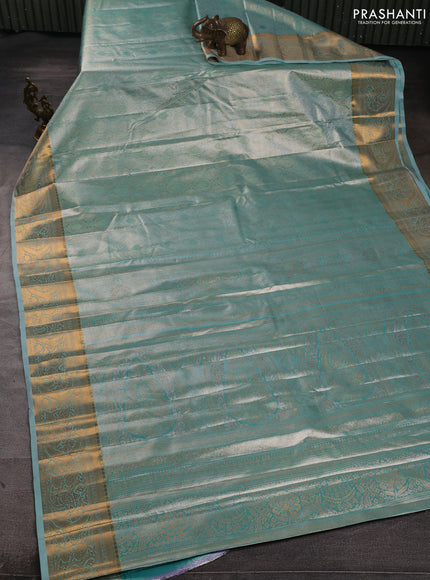 Bangalori tissue silk saree teal green with allover zari woven brocade weaves and zari woven border