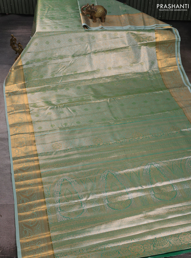 Bangalori tissue silk saree teal green with allover zari woven brocade weaves and zari woven border