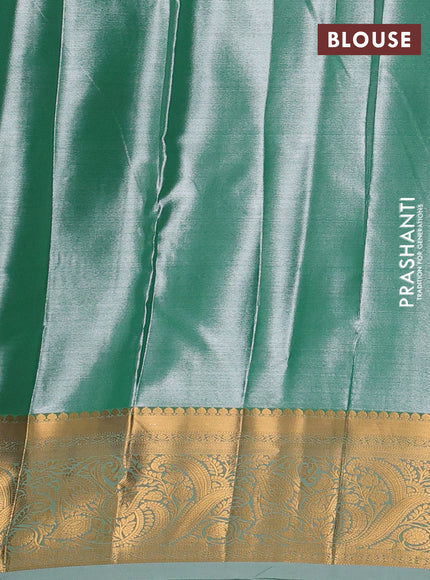 Bangalori tissue silk saree teal green with allover zari woven brocade weaves and zari woven border