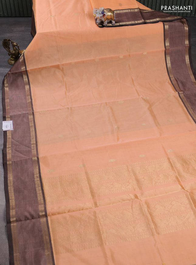 Kanchipuram silk cotton saree pale orange and brown with zari woven buttas and rettapet zari woven border