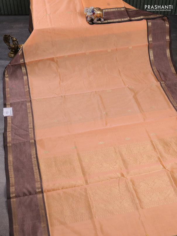 Kanchipuram silk cotton saree pale orange and brown with zari woven buttas and rettapet zari woven border