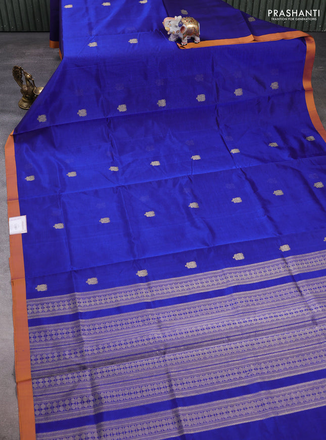 Kanchipuram silk cotton saree blue and orange with zari woven buttas and piping border