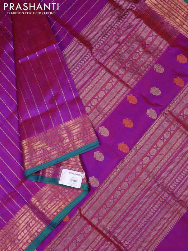 Kanchipuram silk cotton saree purple and teal green with allover zari weaves and zari woven border