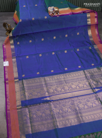 Kanchipuram silk cotton saree dual shade of bluish green and dark mustard with zari woven buttas and rettapet zari woven border