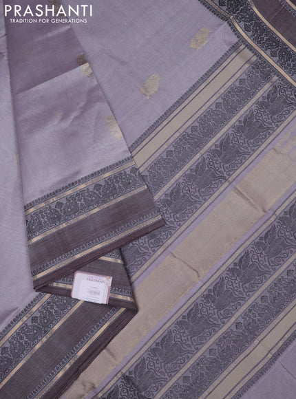 Kanchipuram silk cotton saree pastel grey and pastel brown with zari woven buttas and rettapet thread & zari woven border