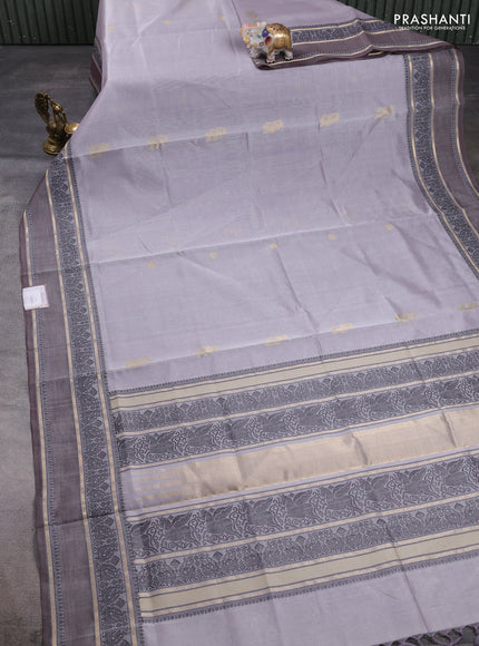 Kanchipuram silk cotton saree pastel grey and pastel brown with zari woven buttas and rettapet thread & zari woven border