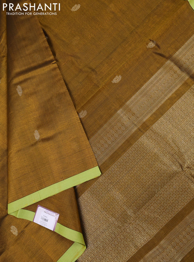 Kanchipuram silk cotton saree dark mustard and pista green with annam zari woven buttas and piping border