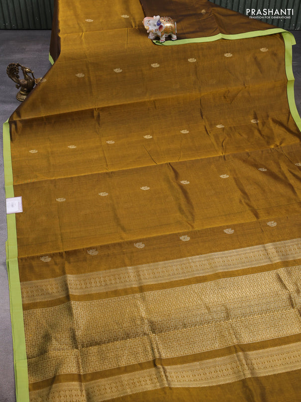 Kanchipuram silk cotton saree dark mustard and pista green with annam zari woven buttas and piping border