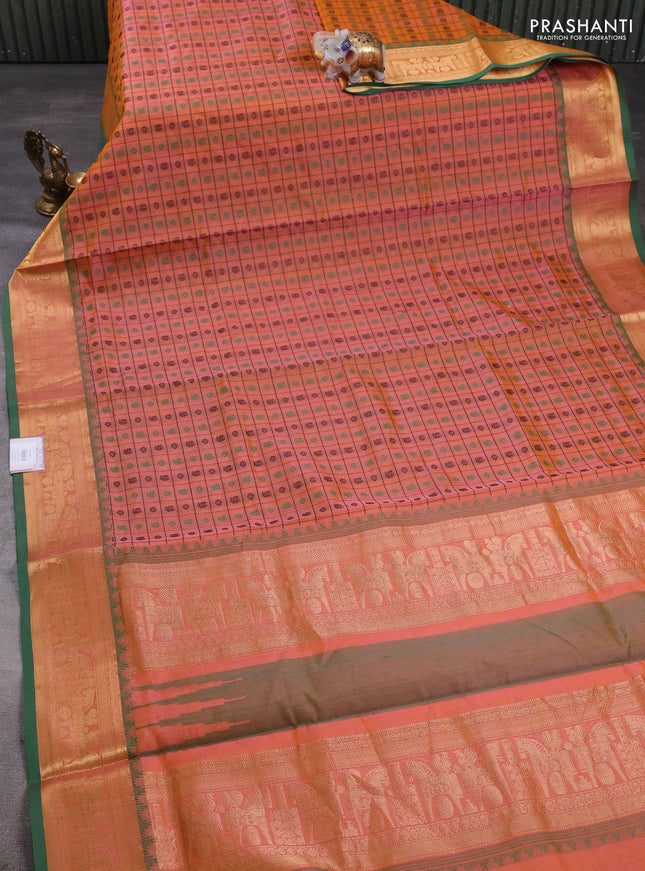 Kanchipuram silk cotton saree dual shade of orange and green with allover thread checks & 1000 buttas and temple design zari woven border