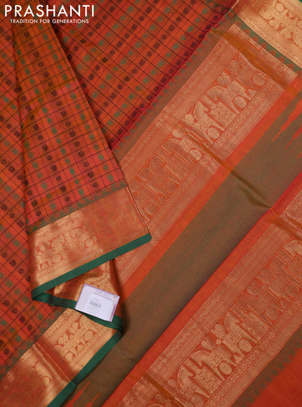 Kanchipuram silk cotton saree dual shade of orange and green with allover thread checks & 1000 buttas and temple design zari woven border