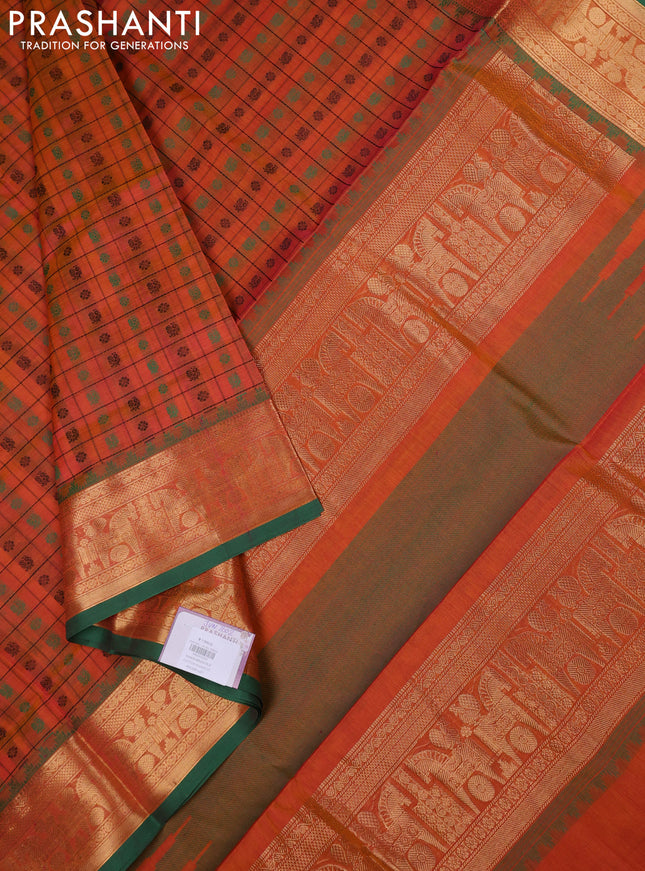 Kanchipuram silk cotton saree dual shade of orange and green with allover thread checks & 1000 buttas and temple design zari woven border