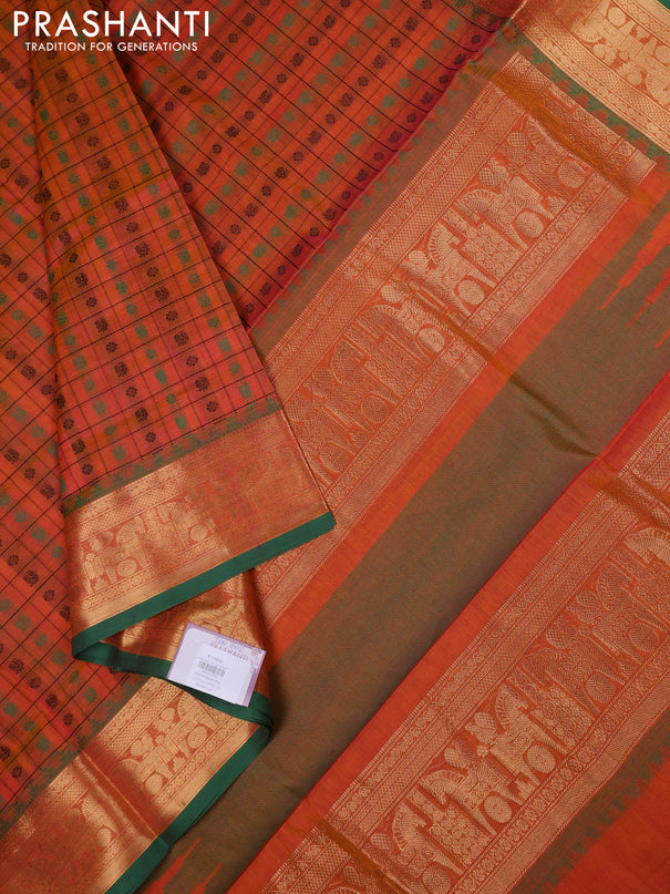 Kanchipuram silk cotton saree dual shade of orange and green with allover thread checks & 1000 buttas and temple design zari woven border