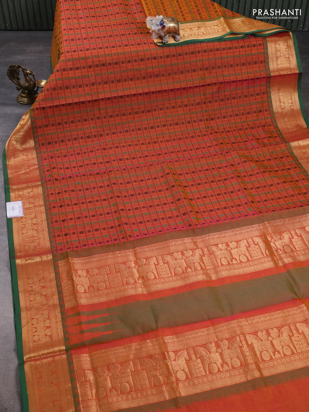 Kanchipuram silk cotton saree dual shade of orange and green with allover thread checks & 1000 buttas and temple design zari woven border