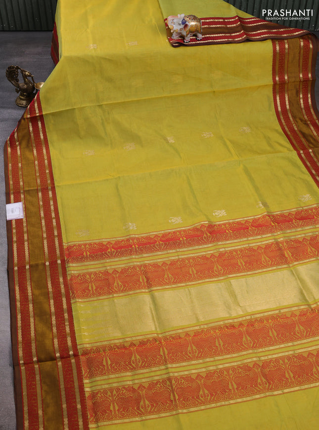 Kanchipuram silk cotton saree lime green and dark mustard with zari woven buttas and rettapet zari woven border