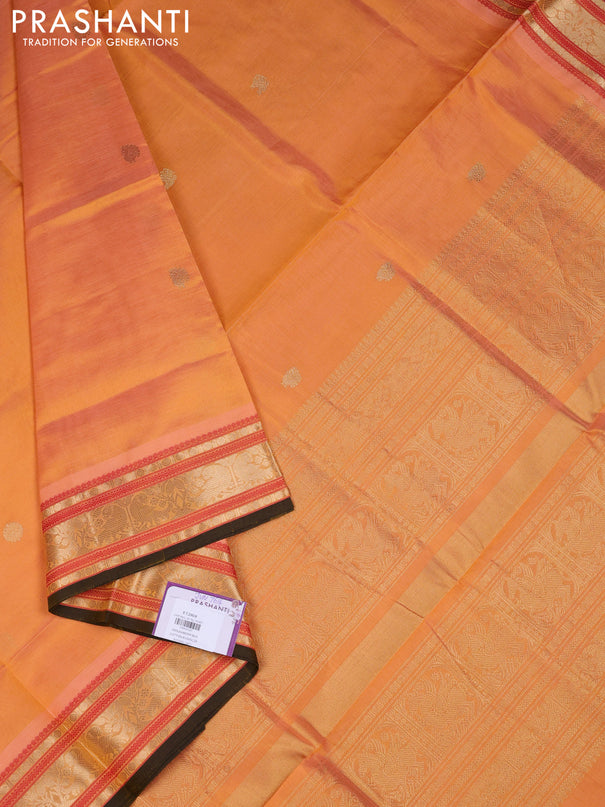 Kanchipuram silk cotton saree pale orange and dark mustard with zari woven buttas and zari woven border