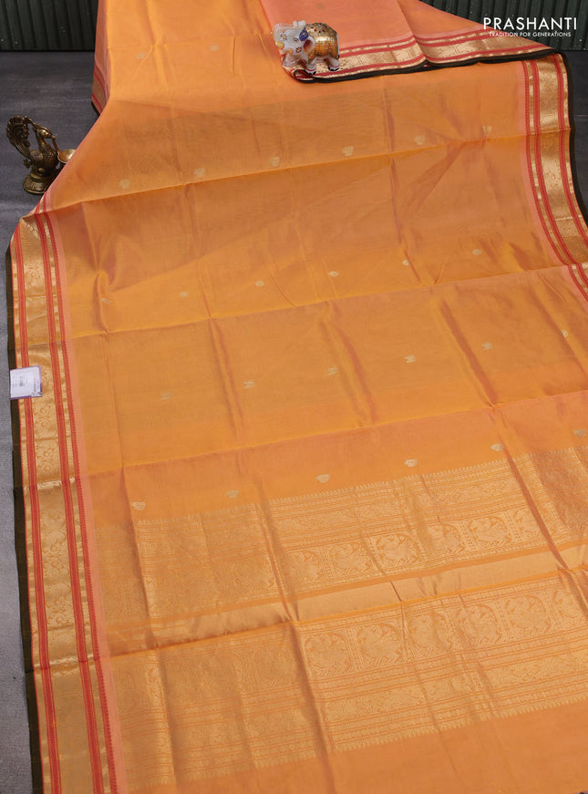 Kanchipuram silk cotton saree pale orange and dark mustard with zari woven buttas and zari woven border