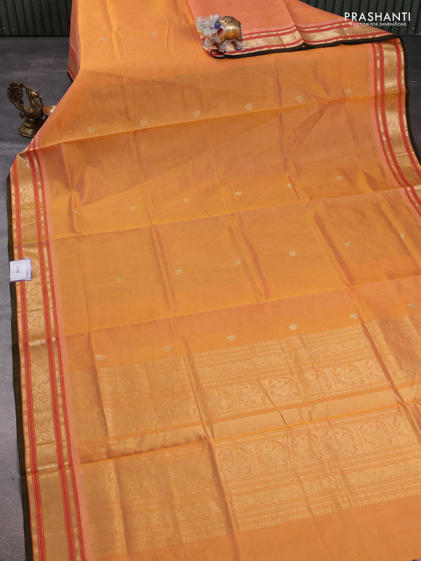 Kanchipuram silk cotton saree pale orange and dark mustard with zari woven buttas and zari woven border
